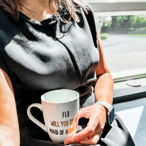 Personalised Maid of Honour proposal mug held in hands with custom name