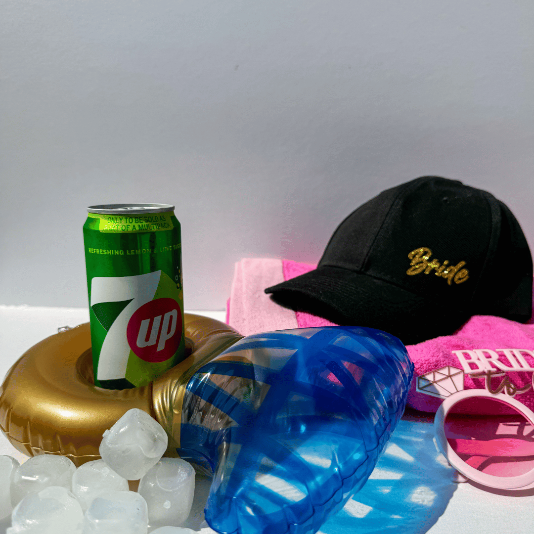 Destination wedding bridal gift box with poolside accessories and bride travel essentials