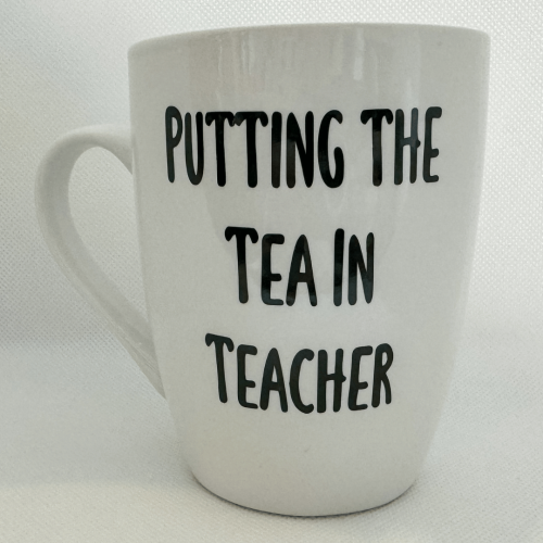 Close-up of teacher gift mug showing printed message clearly
