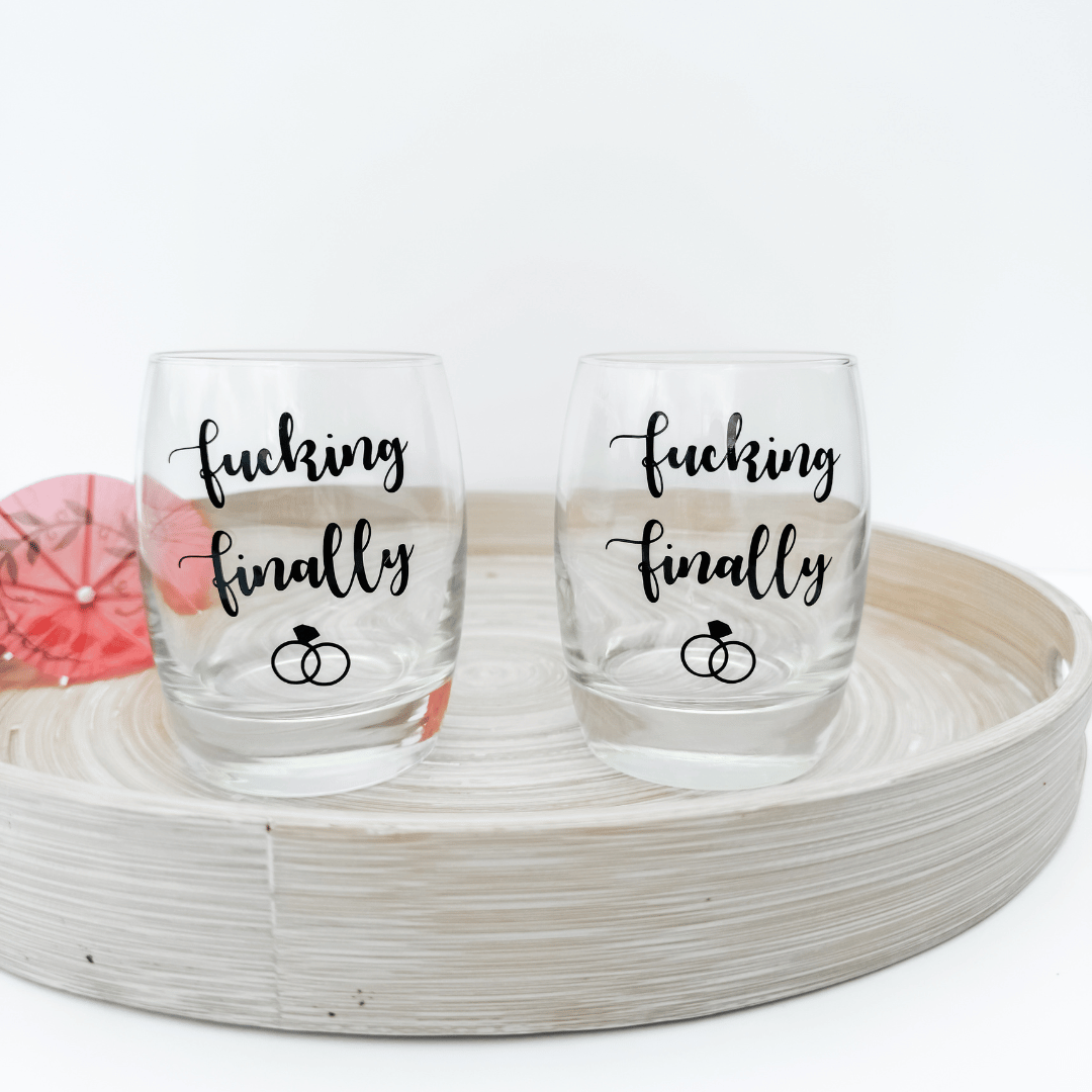 Engagement party glasses with F*cking Finally slogan beautifully gift boxed